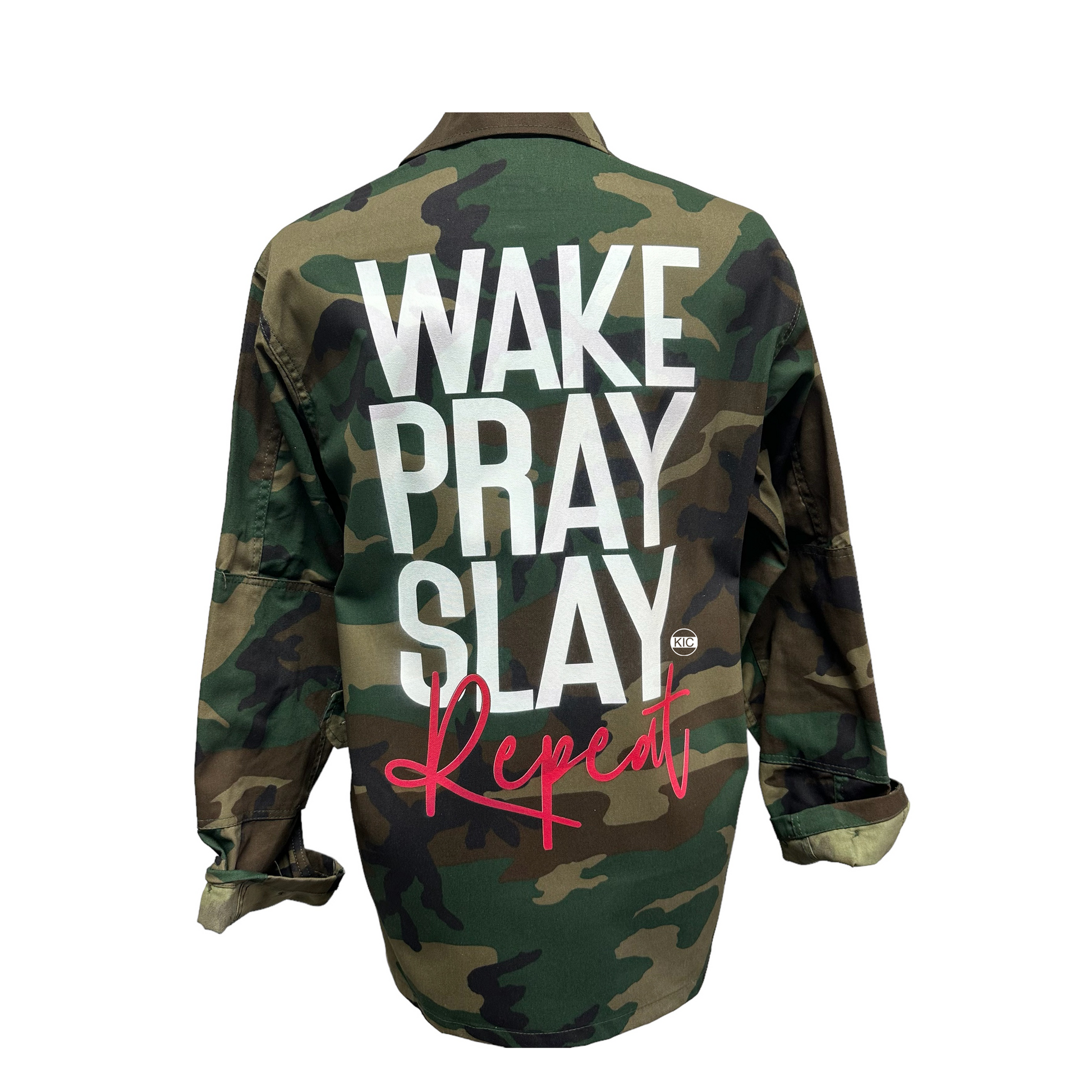 Stylish jacket featuring the empowering text 'Wake. Pray. Slay. Repeat.', symbolizing daily resilience and determination, by KIC NYC.