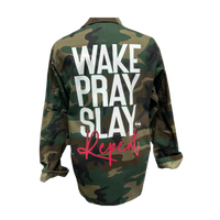 Stylish jacket featuring the empowering text 'Wake. Pray. Slay. Repeat.', symbolizing daily resilience and determination, by KIC NYC.
